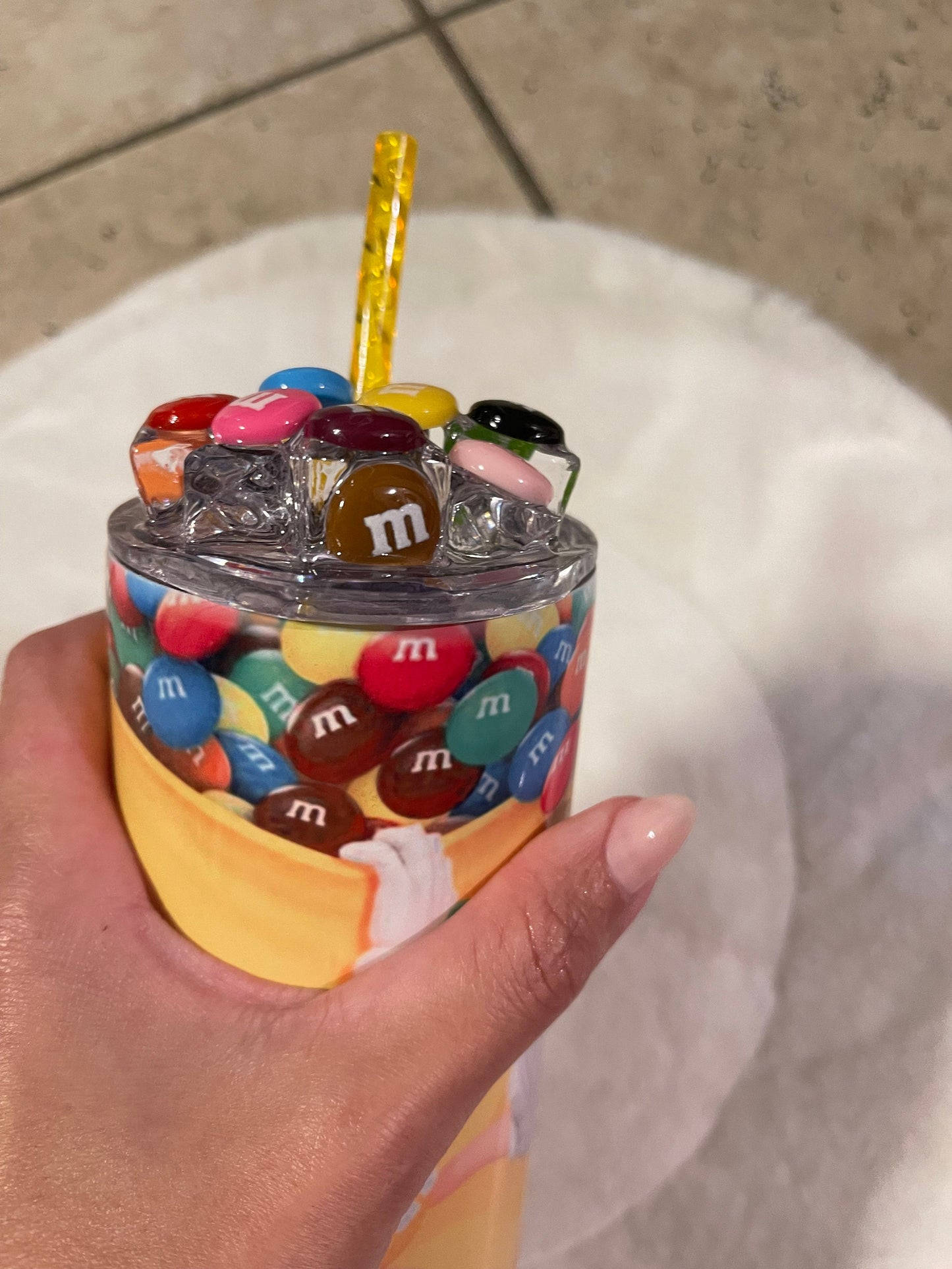 20 oz Straight Double Wall Tumbler, M&M's cup with a 3D Lid with artificial ice cubes and candy. Reusable Plastic yellow straw. summer cup